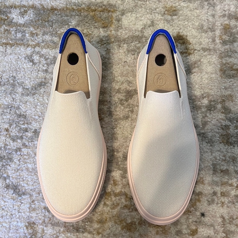 Brand new Rothy’s City slip on sneakers in Pink.